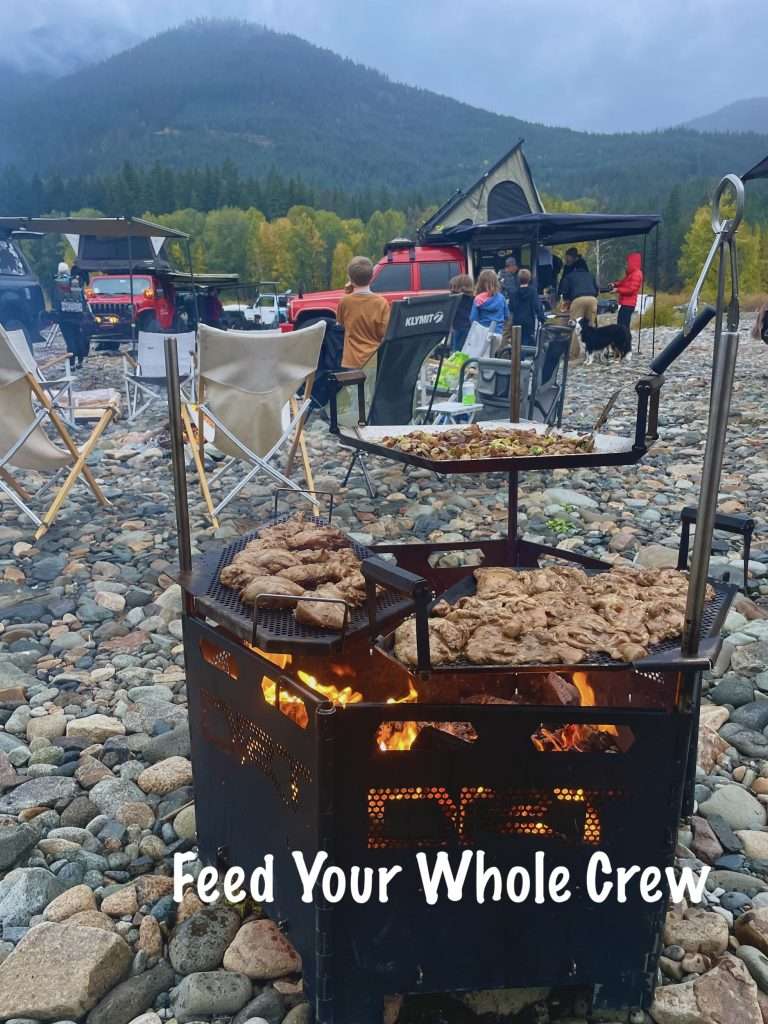 Overland-Cooking-over-fire-big-campfire-meals-road-grill-feeds-many-people-camping-dirt-road-tools