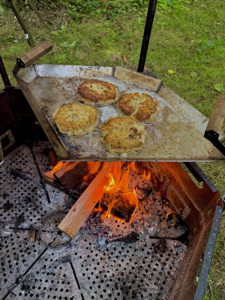 Bacon-fried-potato-pancakes-sizzling-on-the-griddle-the-road-grill-dirt-road-tools
